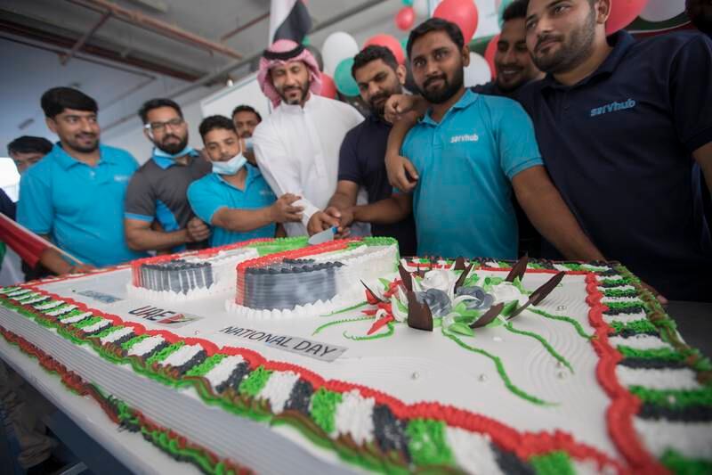A team of 450 construction workers that helped bring Expo 2020 Dubai to life joined in with the Golden Jubilee celebrations on Thursday morning. Photos by Ruel Pableo for The National