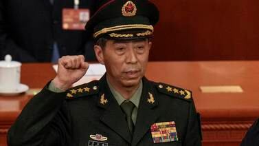 Chinese Defence Minister Gen Li Shangfu is sworn in during a session of China's National People's Congress in Beijing on March 12, 2023. AP