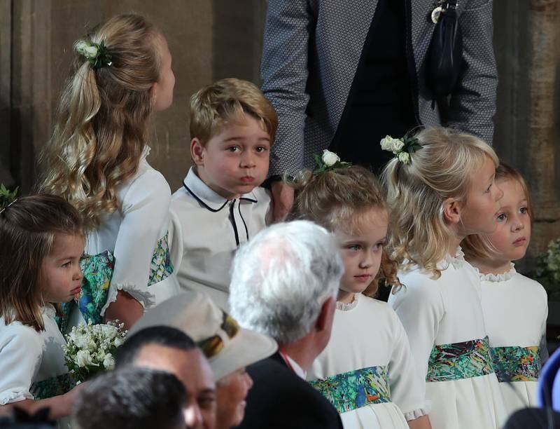 The bridesmaids and page boys, including Prince George, arrive ahead of the wedding of Princess Eugenie of York and Mr Jack Brooksbank at St. George's Chapel, Windsor, in October 2018. Getty Images