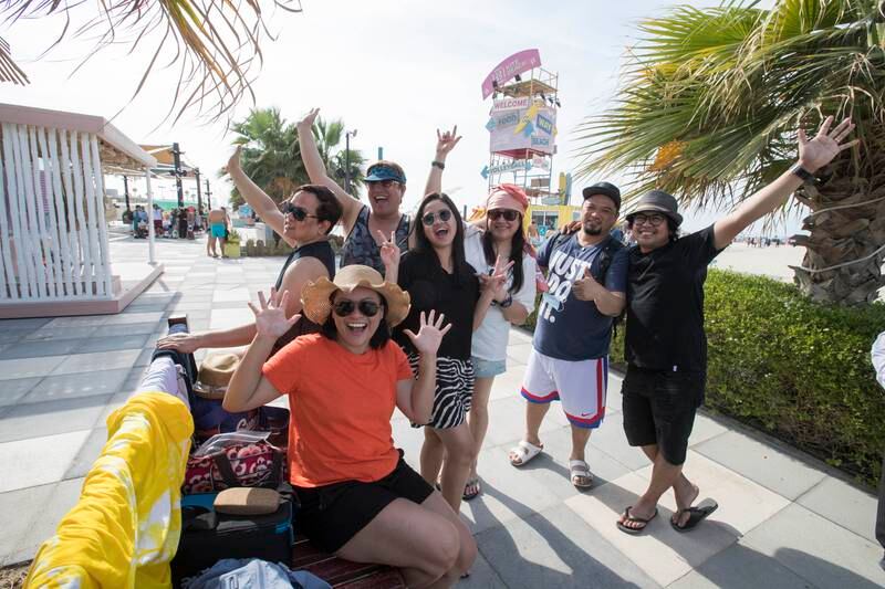 A Filipino Family and friends spend at Kite Beach, Jumeirah Beach Road, in Dubai. Ruel Pableo for The National