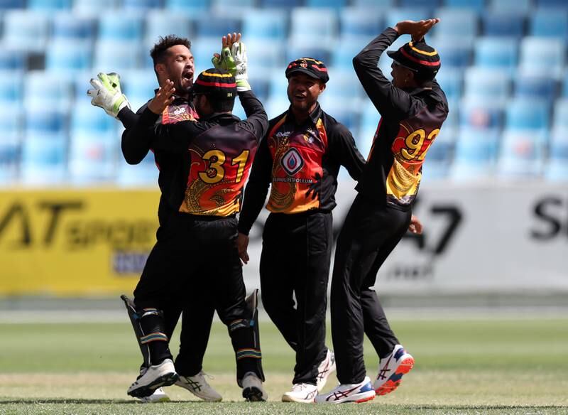 PNG's Chad Soper takes the wicket of UAE's CP Rizwan. The UAE take on Papua New Guinea in an ODI in the ICC Men's Cricket World Cup League 2. Dubai International Stadium. Chris Whiteoak / The National
