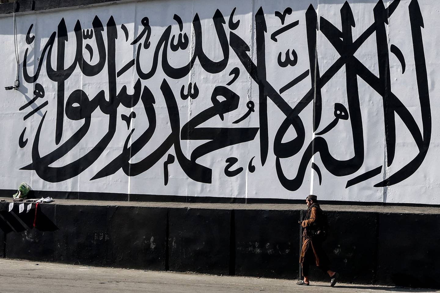 A mural depicting the Taliban flag in Kabul. AFP