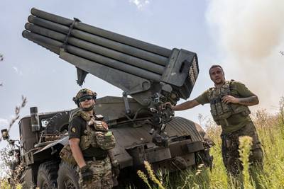 Ukrainian soldiers with a rocket launcher in Donetsk region, eastern Ukraine, in August. Getty Images