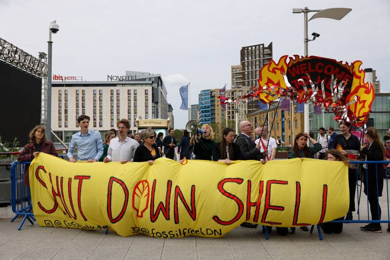 Climate activists protest outside the Shell annual meeting in London. Hollie Adams / Bloomberg