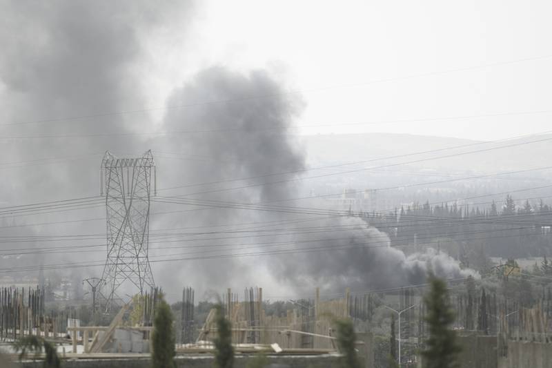 Smoke in the Damascus countryside on October 30 after what Syrian state media said was an Israeli air strike. AP