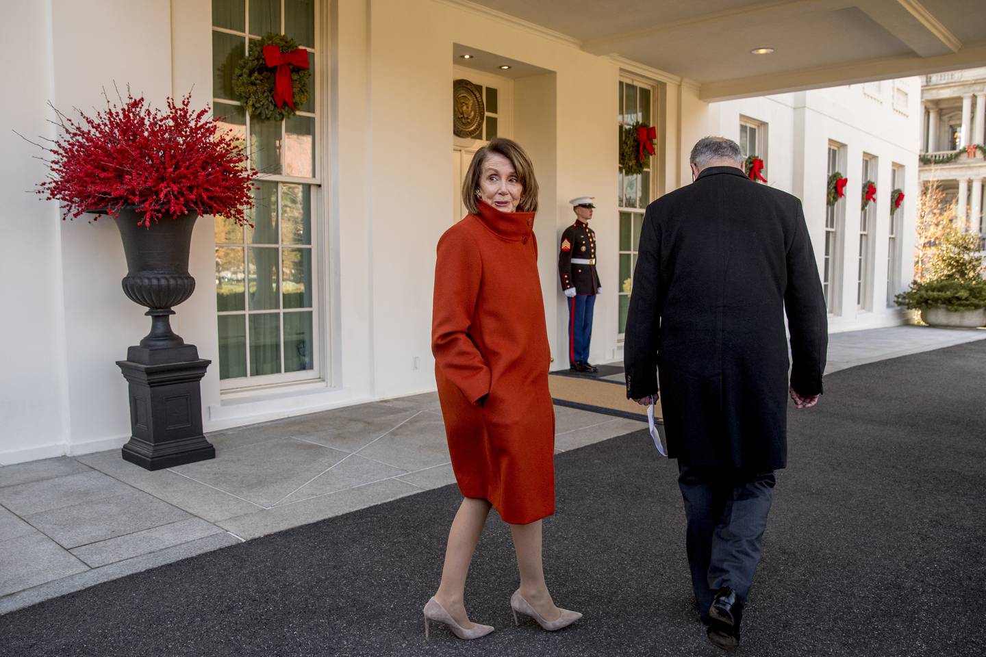 Ms Pelosi outside the White House on December 11, 2018. AP