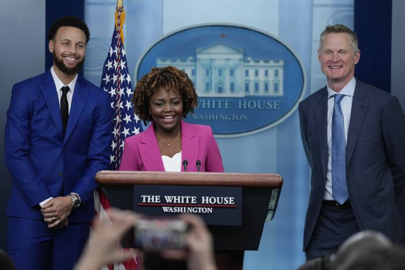 White House Press Secretary Karine Jean-Pierre introduces special guests Golden State Warriors head coach Steve Kerr, right, and Curry at the daily briefing on Tuesday. AP 