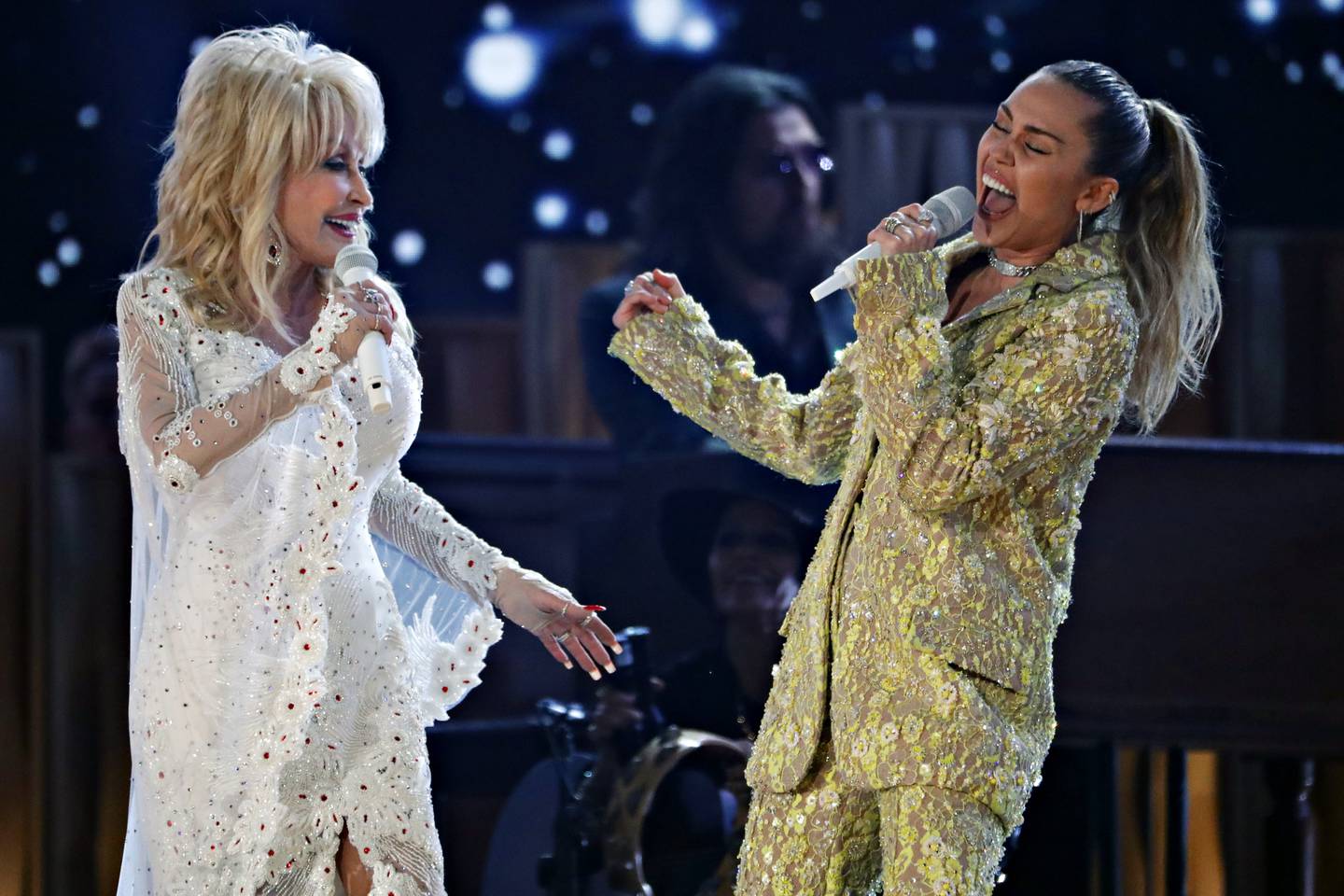 Dolly Parton and Miley Cyrus. Reuters