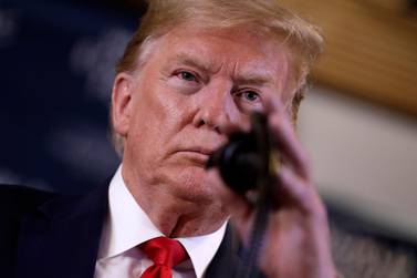FILE - In this Jan. 22, 2020, file photo President Donald Trump attends a news conference at the World Economic Forum in Davos, Switzerland. Trump first publicly mentioned the coronavirus on Jan. 22, during the visit at the economic conference. (AP Photo/Evan Vucci, File)