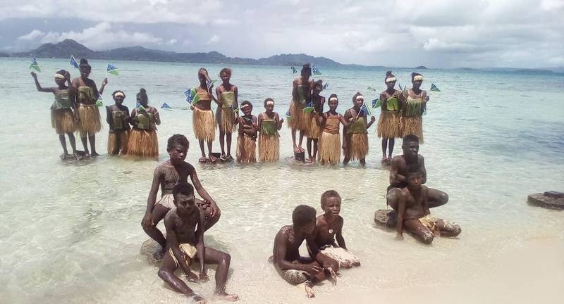 Students attend a climate change protest in Marovo Island, Solomon Islands. 350 PACIFIC via Reuters