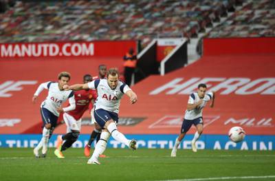 Harry Kane makes it 6-1 to Spurs from the penalty spot. Reuters