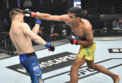 ABU DHABI, UNITED ARAB EMIRATES - JULY 12: (R-L) Raulian Paiva of Brazil punches Zhalgas Zhumagulov of Kazakhstan in their flyweight fight during the UFC 251 event at Flash Forum on UFC Fight Island on July 12, 2020 on Yas Island, Abu Dhabi, United Arab Emirates. (Photo by Jeff Bottari/Zuffa LLC)