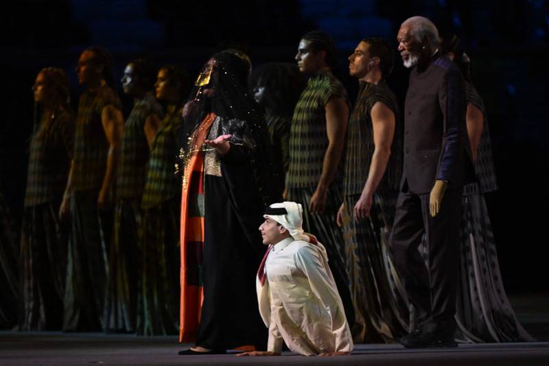 Al Muftah is joined by Qatari singer Dana Al Fardan and performers on stage. AFP