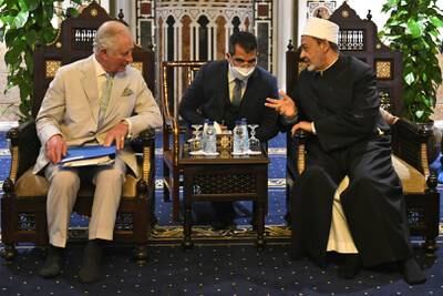 Egyptian Islamic scholar and the Grand Imam of Al Azhar mosque, Sheikh Ahmed Al Tayeb, right, meets Prince Charles, left, at the mosque in Cairo.  AFP