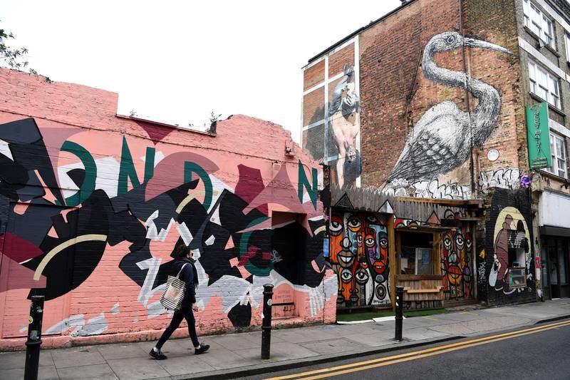 Street art adorns buildings in the Brick Lane area of East London. EPA