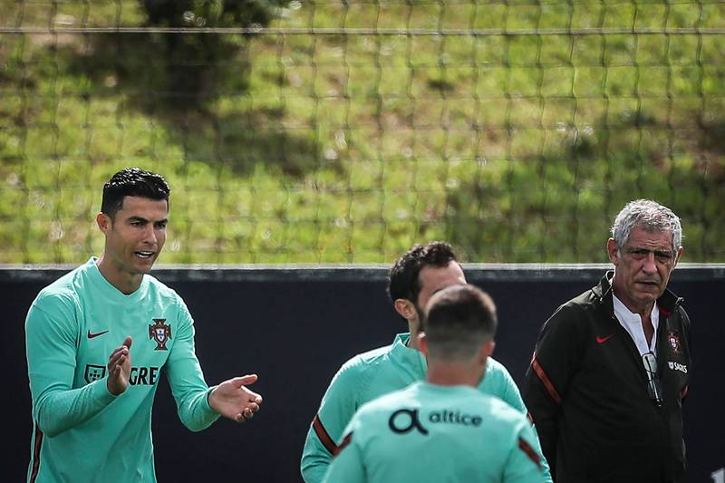 Portugal's Cristiano Ronaldo, left, and coach Fernando Santos, right. AFP