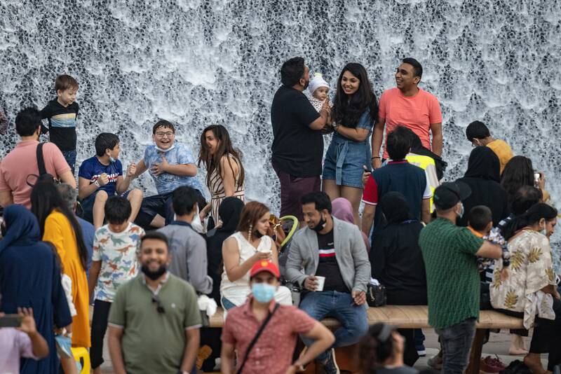 People take photos at Surreal - The Water Feature.