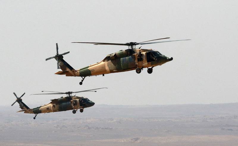 Black Hawk Jordanian helicopters in formation. AFP