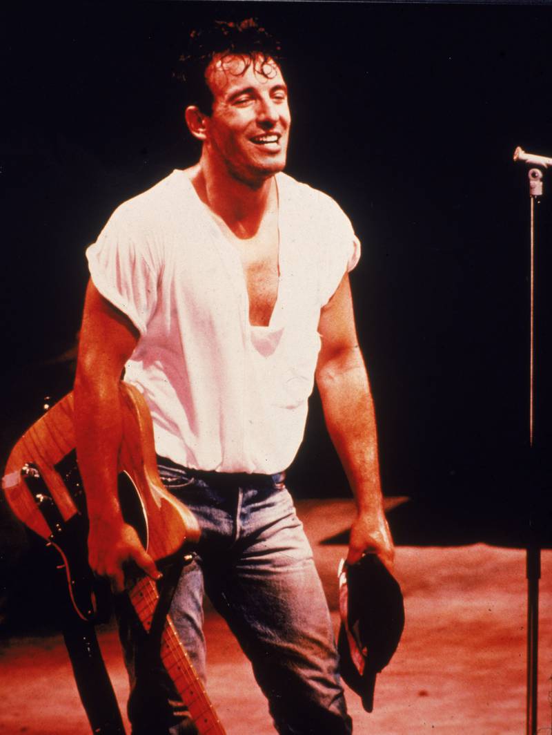 On stage during a concert in the 1980s. Getty Images