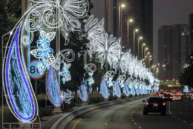 Decorative lights have been put up along the Corniche in Abu Dhabi. Victor Besa / The National
