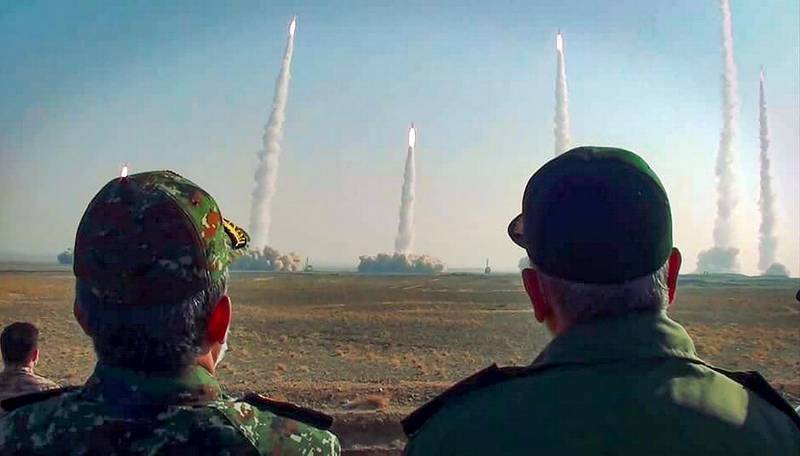 This handout photo provided by Iran's Revolutionary Guard Corps (IRGC) official website via SEPAH News on January 15, 2021, shows the head of Iran's Revolutionary Guard Corps Hossein Salami (R) watching a launch of missiles during a military drill in an unknown location in central Iran.  Iran's Revolutionary Guards  launched a missile and drone drill in central Iran, their official website reported, marking the third exercise held by the country's military in almost two weeks. - / XGTY / RESTRICTED TO EDITORIAL USE - MANDATORY CREDIT "AFP PHOTO / Iran's Revolutionary Guard via SEPAH NEWS" - NO MARKETING - NO ADVERTISING CAMPAIGNS - DISTRIBUTED AS A SERVICE TO CLIENTS
 / AFP / SEPAH NEWS / - / / XGTY / RESTRICTED TO EDITORIAL USE - MANDATORY CREDIT "AFP PHOTO / Iran's Revolutionary Guard via SEPAH NEWS" - NO MARKETING - NO ADVERTISING CAMPAIGNS - DISTRIBUTED AS A SERVICE TO CLIENTS
