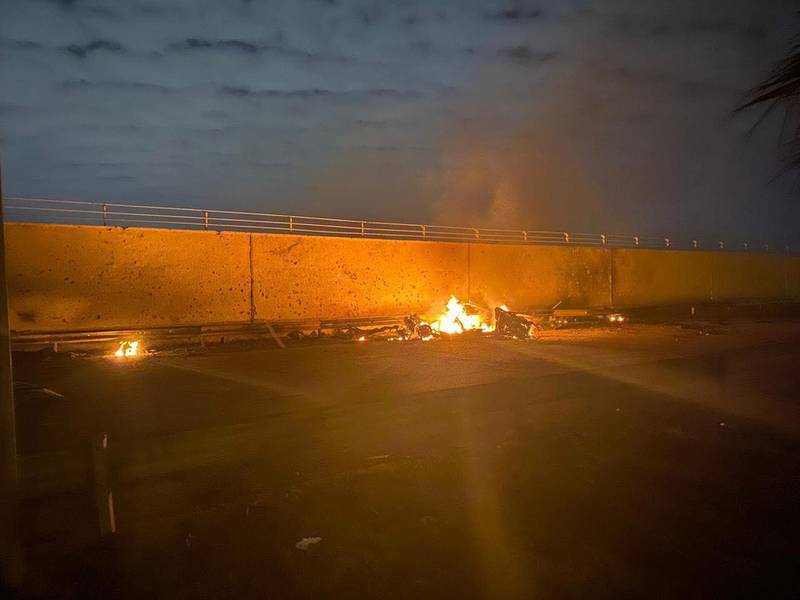 A burning vehicle near Baghdad International Airport, Iraq. Security Media Cell / EPA