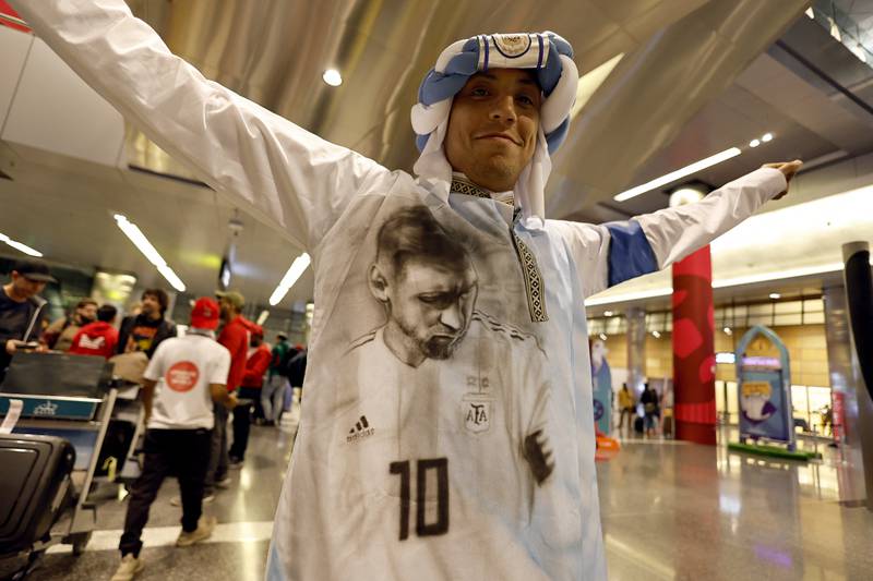 Fan wears an image of Argentina's Lionel Messi close to his heart. Reuters