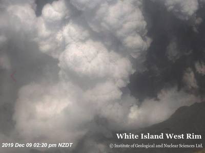 Smoke billowing above the crater of Whakaari, also known as White Island. GNS Science via Reuters
