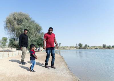 DUBAI, UNITED ARAB EMIRATES. 2 DECEMBER 2019. Surannya Arun’s husband (in red), at Al Qudra lake with his family on UAE National Day.(Photo: Reem Mohammed/The National)Reporter:Section: