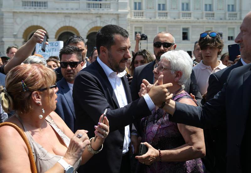 Italy's deputy prime minister Matteo Salvini is greeted by supporters in Trieste, Italy, Friday, July 5, 2019. Salvini said Friday that Italy is ready to use more resources to "seal the border with Slovenia and definitively stop the entrance of illegal migrants." But he stopped short of mentioning a plan to build an anti-migrant wall along the Slovenian border, previously mentioned by the League's regional governor. (AP Photo)