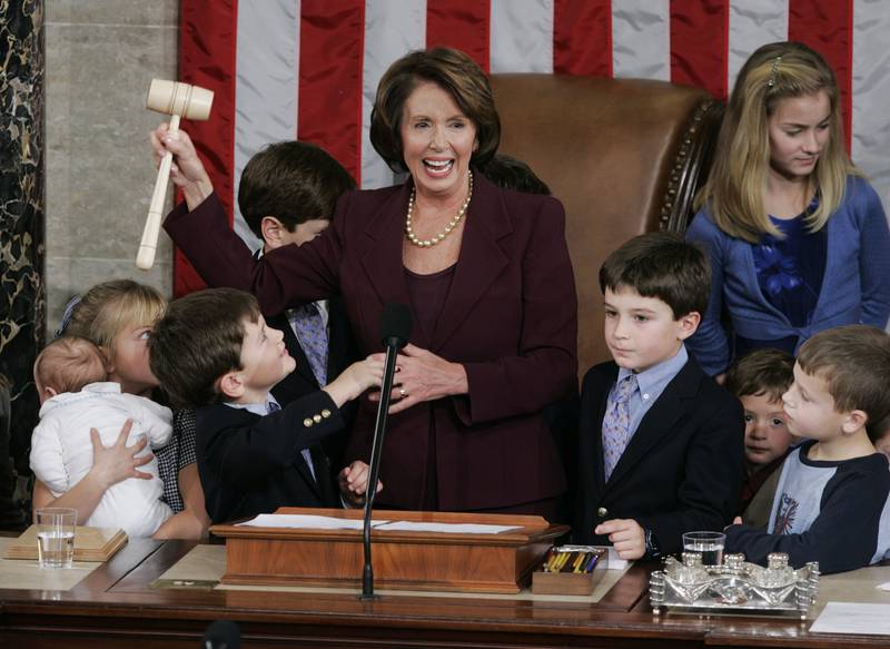 Ms Pelosi surrounded by children and grandchildren in 2007. AP