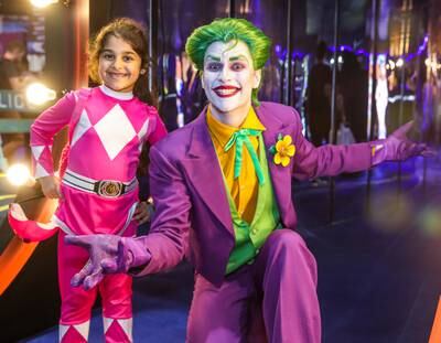 Ruqaya Alsalem as a Pink Power Ranger with The Joker