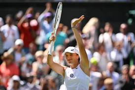 Swiatek recovers from second-set stumble to seal victory at Wimbledon