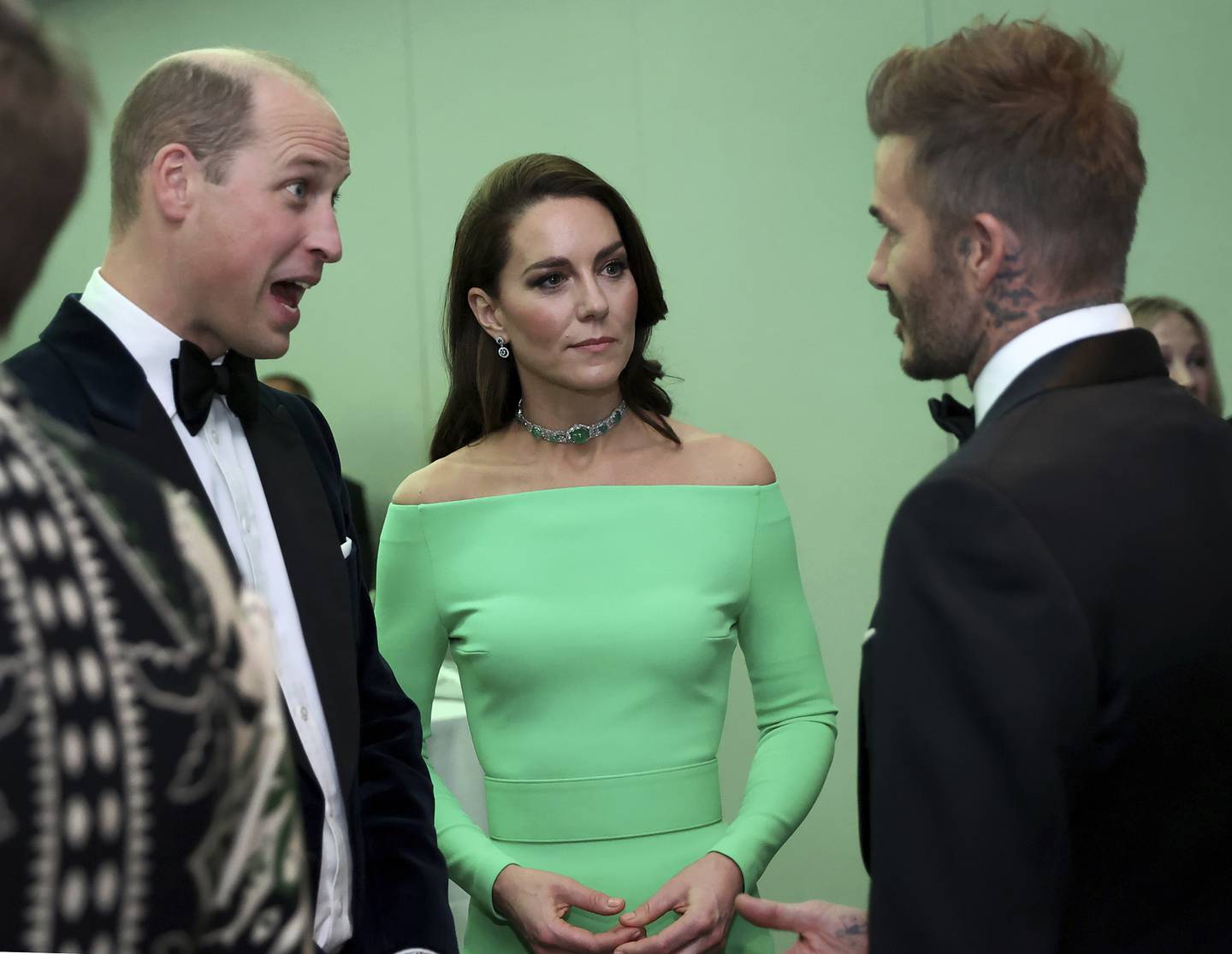 Kate, Princess of Wales, sports a rented dress as she chats with David Beckham and her husband Prince William at The Earthshot Prize awards on Friday. AP