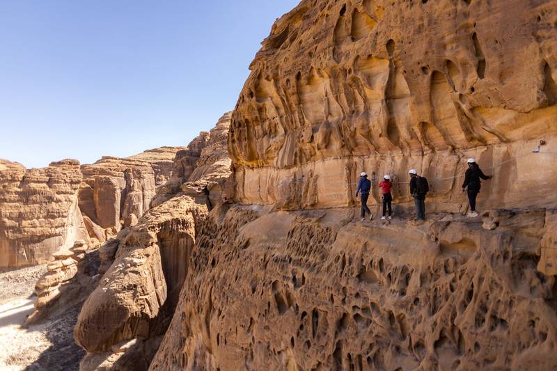 Tackle cliff face climbing on a via ferrata in AlUla. Photo: Visit AlUla
