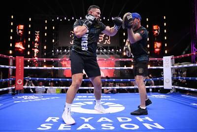 Parker hits the pads during a public session ahead of his fight on Saturday with Kean. Getty