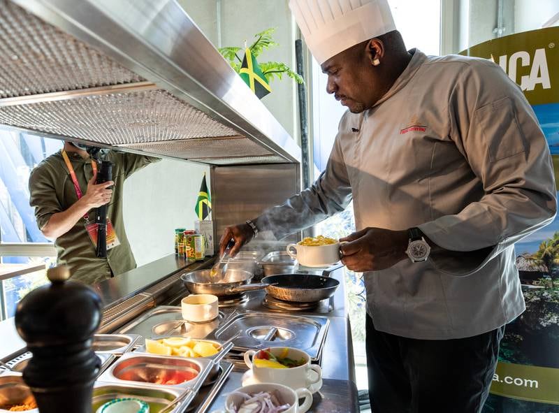 Chef Wenford Simpson serves up delicious Jamaican dishes, including ackee and saltfish and jerk chicken, for the country's national day at Expo 2020. Victor Besa / The National