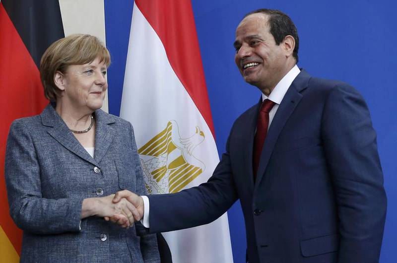 German chancellor Angela Merkel and with Egyptian president Abdel Fattah El Sisi after the announcement of the deal. Fabrizio Bensch / Reuters