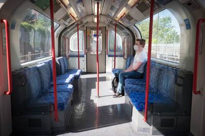 A lone passenger on the Central Line in London. PA