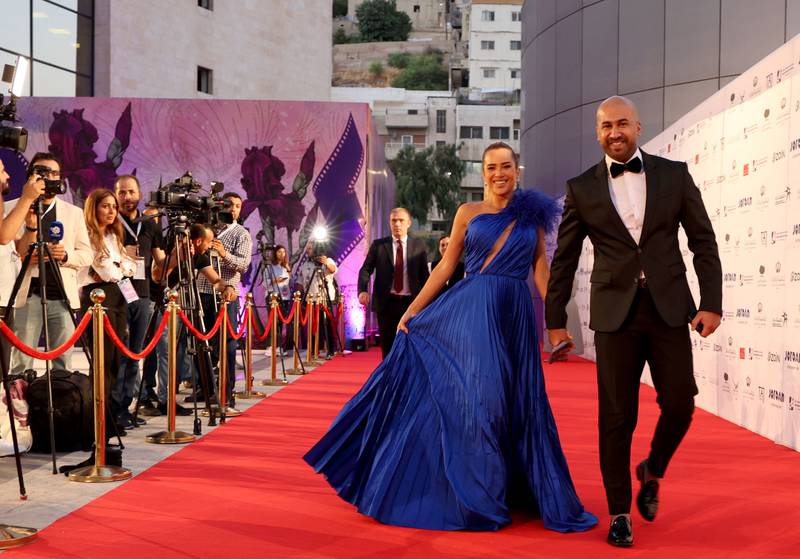 Jordanian influencer Haya Awad and her husband Mohamad Shakhrity posing on the red carpet during the opening of the Amman International Film Festival. All Photos: Amman International Film Festival 