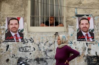 Posters in Al Tariq Al Jadida, Beirut, depict Lebanon’s former prime minister Saad Hariri. Reuters