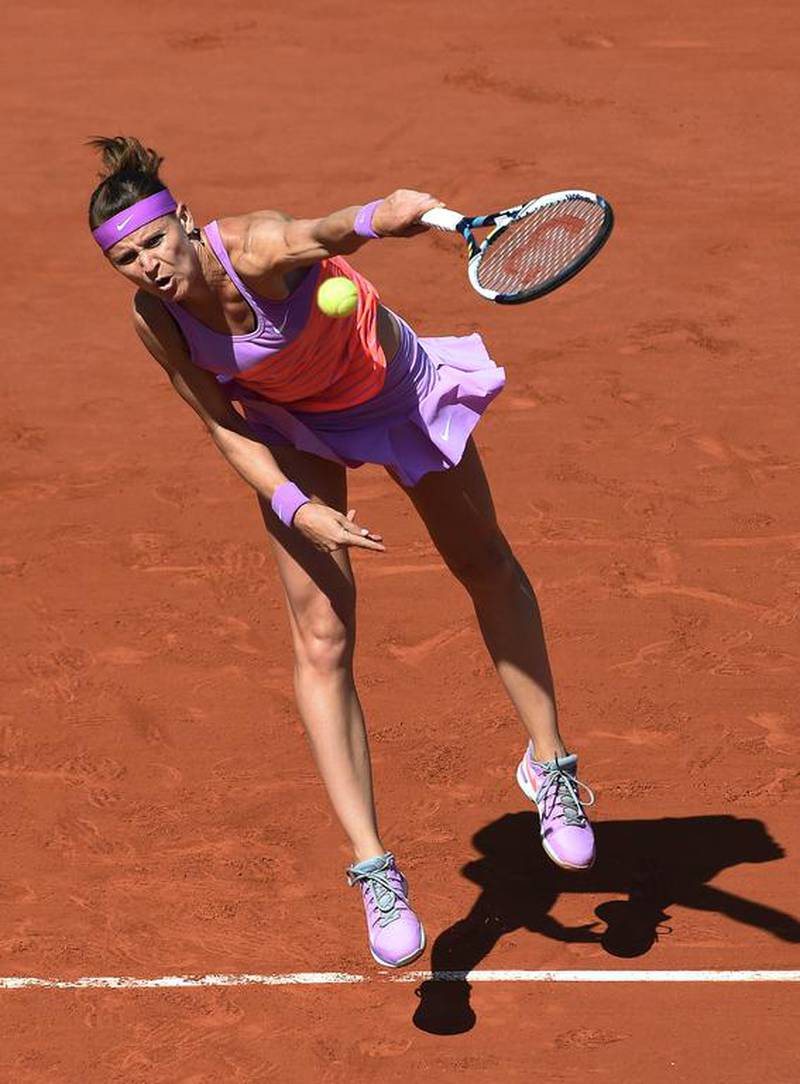 Czech Republic's Lucie Safarova serves to Serbia's Ana Ivanovic during their women's semi-final match of the Roland Garros 2015 French Tennis Open in Paris on June 4, 2015. AFP PHOTO / PASCAL GUYOT