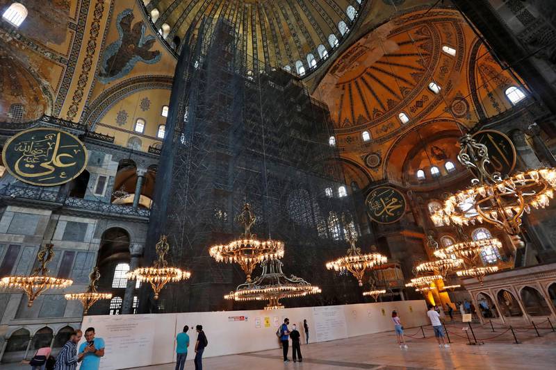 People visit Hagia Sophia, a Unesco World Heritage Site, in Istanbul. Turkey’s top administrative court announced its decision to revoke the 1,500-year-old former cathedral’s status as a museum. Reuters