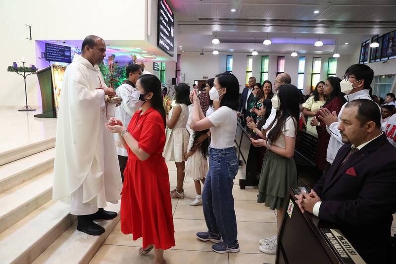 People at the Christmas Mass at St Mary's Chruch in Dubai