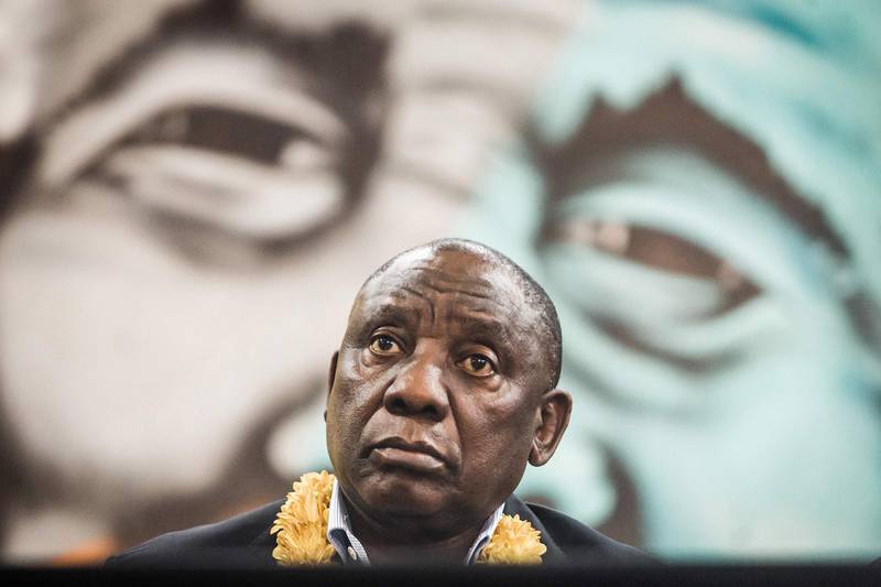 TOPSHOT - South African President Cyril Ramaphosa looks on during a meeting of the South African ruling Party African National Congress (ANC)  "Thuma Mina" (Send Me) campaign launch at the Nelson Mandela Youth Centre in Chatsworth township outside of Durban on September 8, 2018. - The campaign is a preparation for the 2019 general elections. (Photo by RAJESH JANTILAL / AFP)
