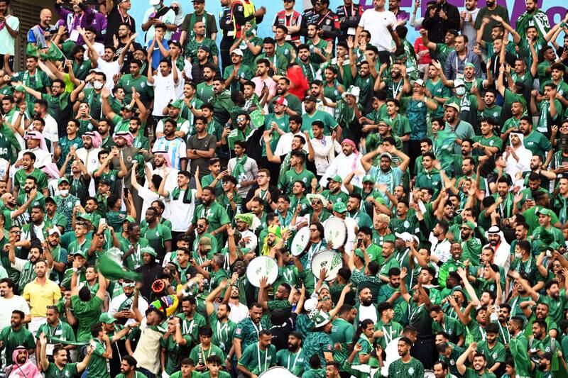 Saudi fans celebrate after their national team beat Argentina 2-1 in the World Cup at the Lusail Stadium in Qatar. EPA