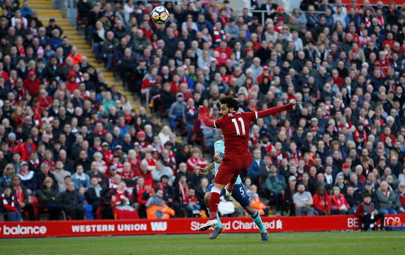 Soccer Football - Premier League - Liverpool vs AFC Bournemouth - Anfield, Liverpool, Britain - April 14, 2018   Liverpool's Mohamed Salah scores their second goal       REUTERS/Andrew Yates    EDITORIAL USE ONLY. No use with unauthorized audio, video, data, fixture lists, club/league logos or "live" services. Online in-match use limited to 75 images, no video emulation. No use in betting, games or single club/league/player publications.  Please contact your account representative for further details.
