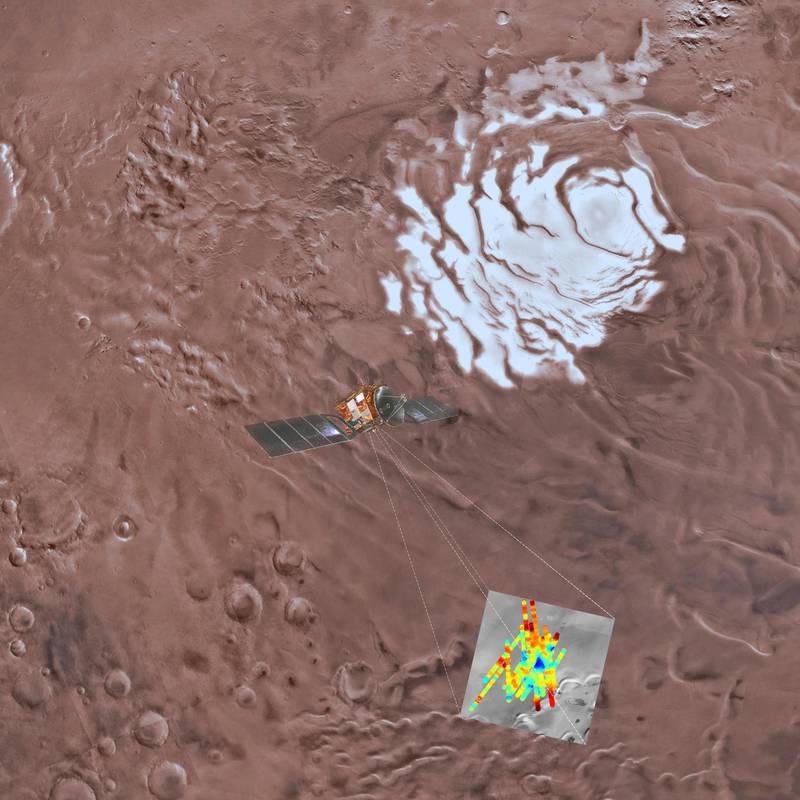 This image provided by the ESA/INAF shows an artist's rendering of the Mars Express spacecraft probing the southern hemisphere of Mars. At upper right is the planet's southern ice cap. The inset image at lower right shows the area where radar readings were made. The blue triangle indicates an area of very high reflectivity, interpreted as being caused by the presence of a reservoir of water, about a mile below the surface. (Davide Coero Borga/INAF/ESA via AP)