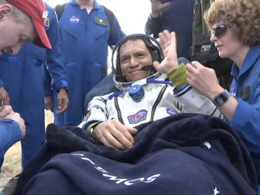 As it happened: Astronauts stuck in space for a year complete return to Earth
