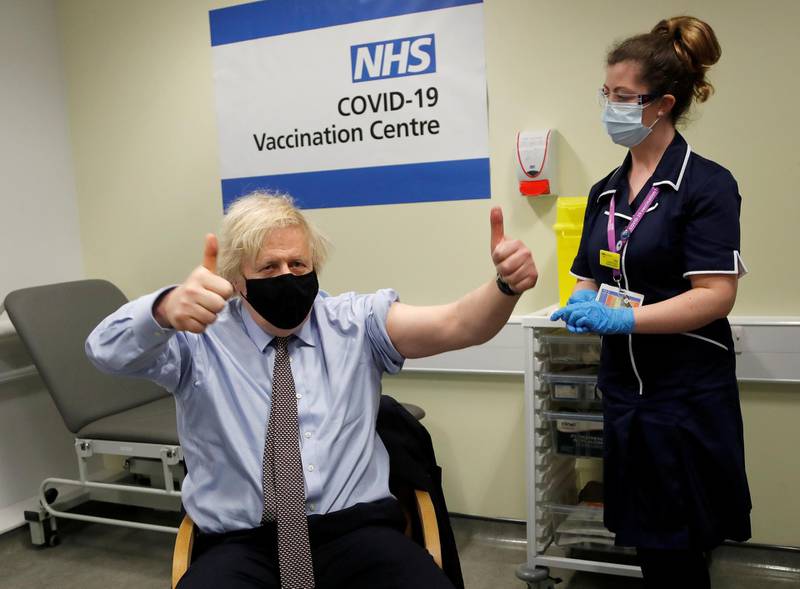 British Prime Minister Boris Johnson reacts after receiving a dose of the AstraZeneca vaccine in London. Reuters